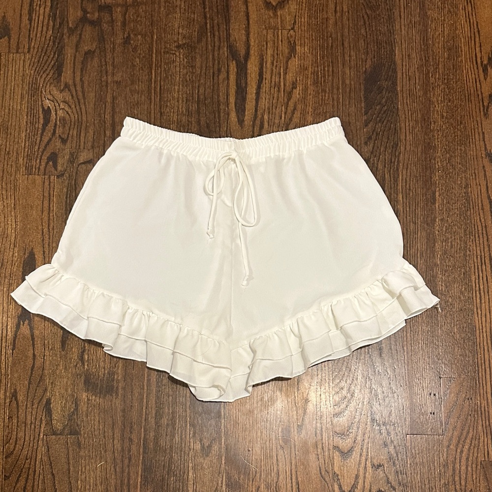 Women's White Ruffle Hem Shorts